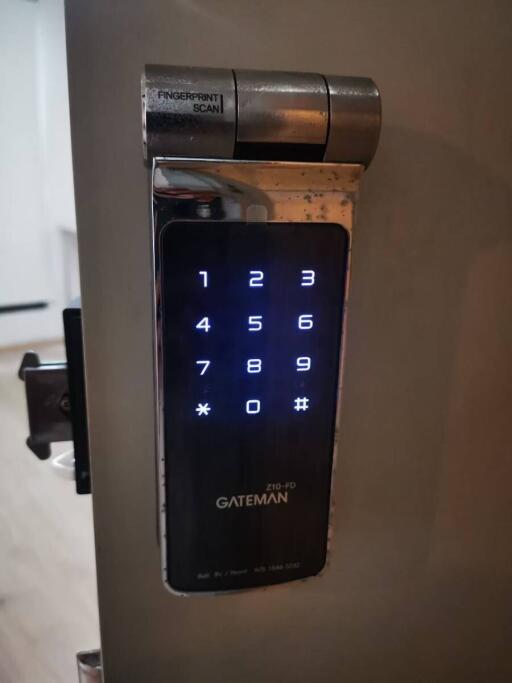 Digital keypad door lock with fingerprint scan