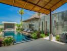 Outdoor patio area with pool and seating