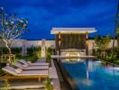 Luxurious outdoor pool area with lounge chairs and covered seating space