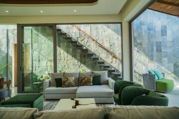 Modern living room with large windows and natural light