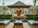 Luxurious poolside view with a modern villa in the background