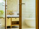 Modern bathroom with wooden accents, a vessel sink, and a standalone bathtub