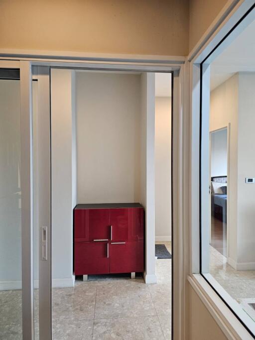 Hallway with red cabinet