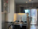 Modern kitchen view through glass partition