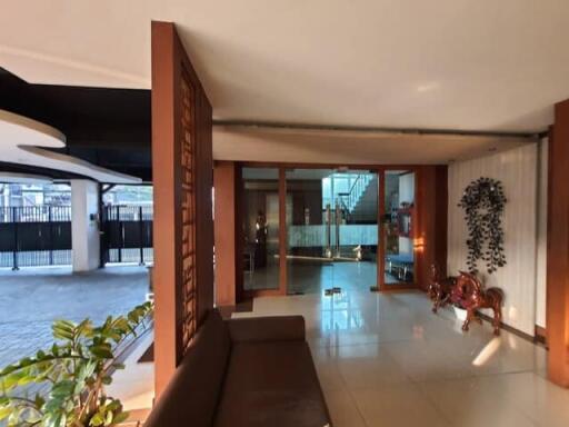 Spacious and well-lit entrance area with modern decor