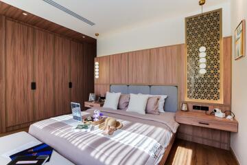 Modern bedroom with wooden accents and contemporary decor