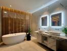 Modern bathroom with freestanding bathtub and double sinks