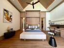 Spacious modern bedroom with a high ceiling and stylish decor