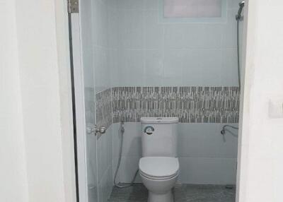 bright bathroom with modern tiles and fixtures