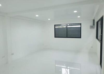 Modern empty room with white walls and windows