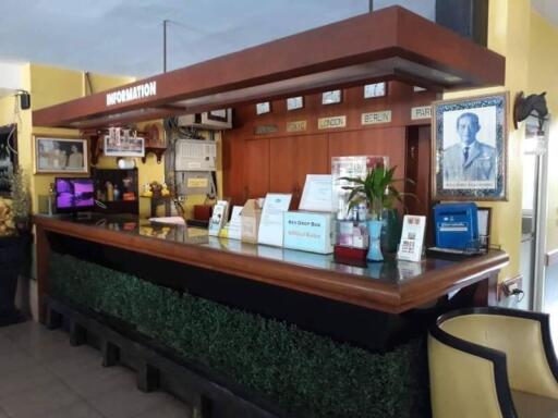 Reception desk with informational materials and decor