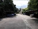 Outdoor parking lot with several cars