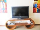 Living room with TV and modern wooden console