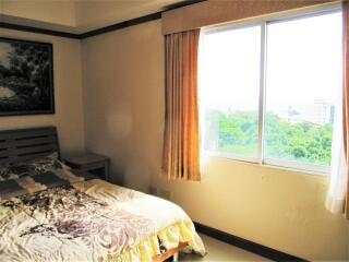 Bedroom with window and bed