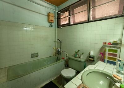 Bathroom with bathtub and sink