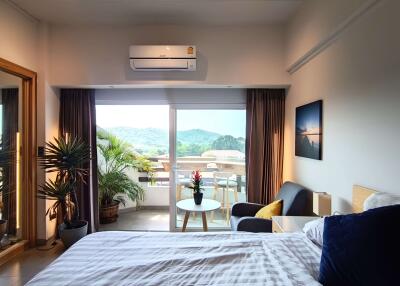 Modern bedroom with balcony view