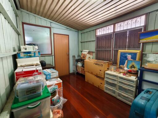 Room filled with various packed boxes and items