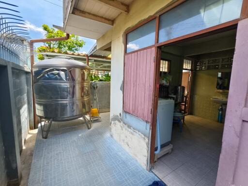 For sale: a 2-story wooden house located in the Bang Khun Non, Bang O, and Pinklao areas. The property is 36 square wah in size, ideal for renovation into a cozy and warm white wooden house, given