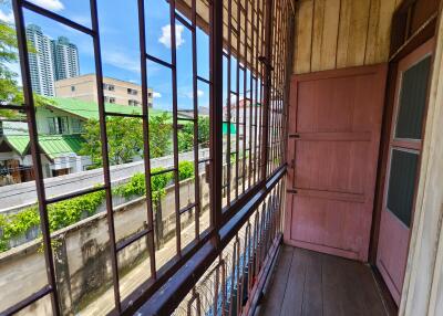 Balcony view with neighboring buildings