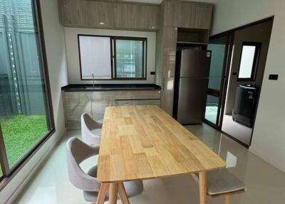 Modern kitchen with dining table