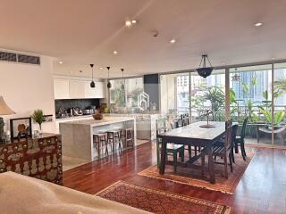 Spacious open-concept living area with kitchen and dining space