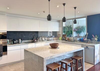 Modern kitchen with island and bar stools