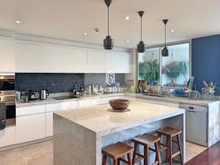 Modern kitchen with island and bar stools