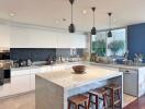 Modern kitchen with island and bar stools