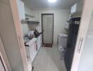 Compact kitchen with appliances and storage