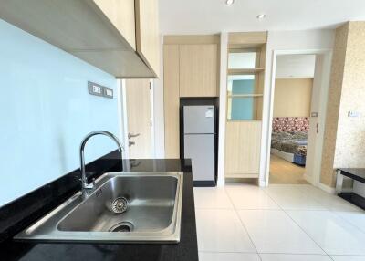 Modern kitchen with stainless steel sink and built-in appliances