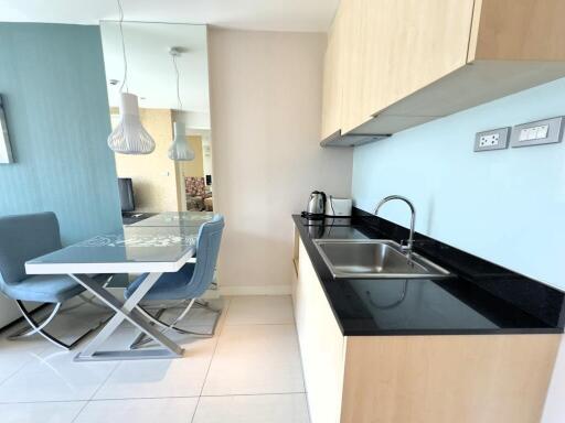 Modern kitchen and dining area with sleek fixtures