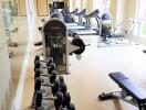 Well-equipped gym with modern exercise machines and free weights