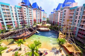 Condos surrounding a central pool with ship-themed decor