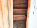 Wooden interior of a sauna with seating benches