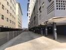 Exterior view of apartment buildings and parking area