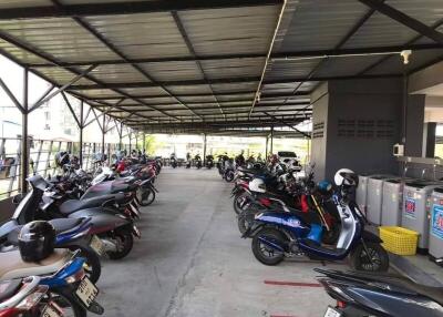 Covered parking area with multiple motorcycles