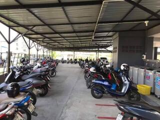 Covered parking area with multiple motorcycles