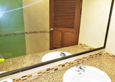 Bathroom with vanity mirror and granite countertop