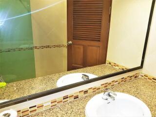 Bathroom with vanity mirror and granite countertop