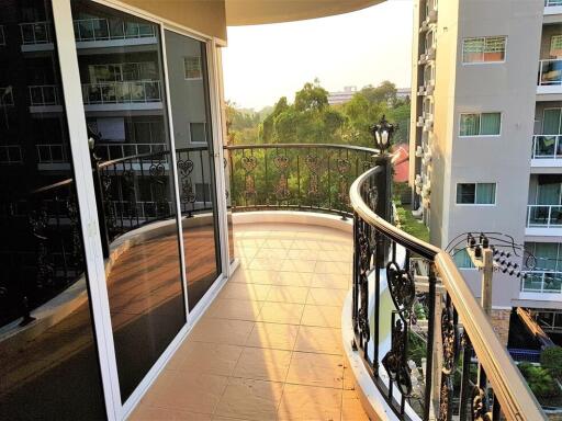 Spacious balcony with railing and scenic view