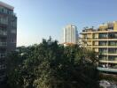 View of residential buildings with greenery