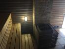 Interior view of a sauna with wooden benches and a heater