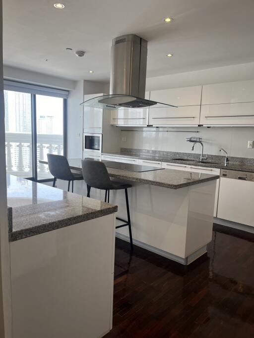 Modern kitchen with island and bar stools