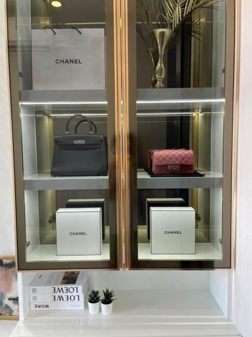 Luxury display cabinet with designer items