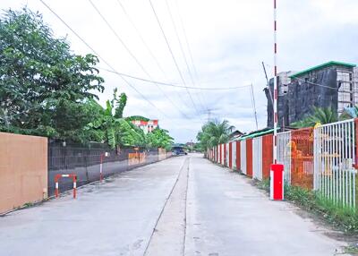 Gated entrance on a quiet street