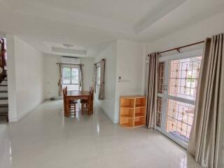 Spacious living area with dining space