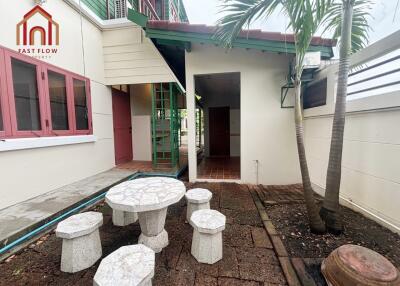 Outdoor seating area with table and chairs