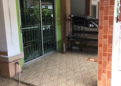 Covered porch with floor tiles