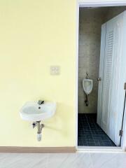 Bathroom with sink and urinal