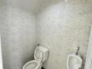 Bathroom with tiled walls, toilet, and urinal